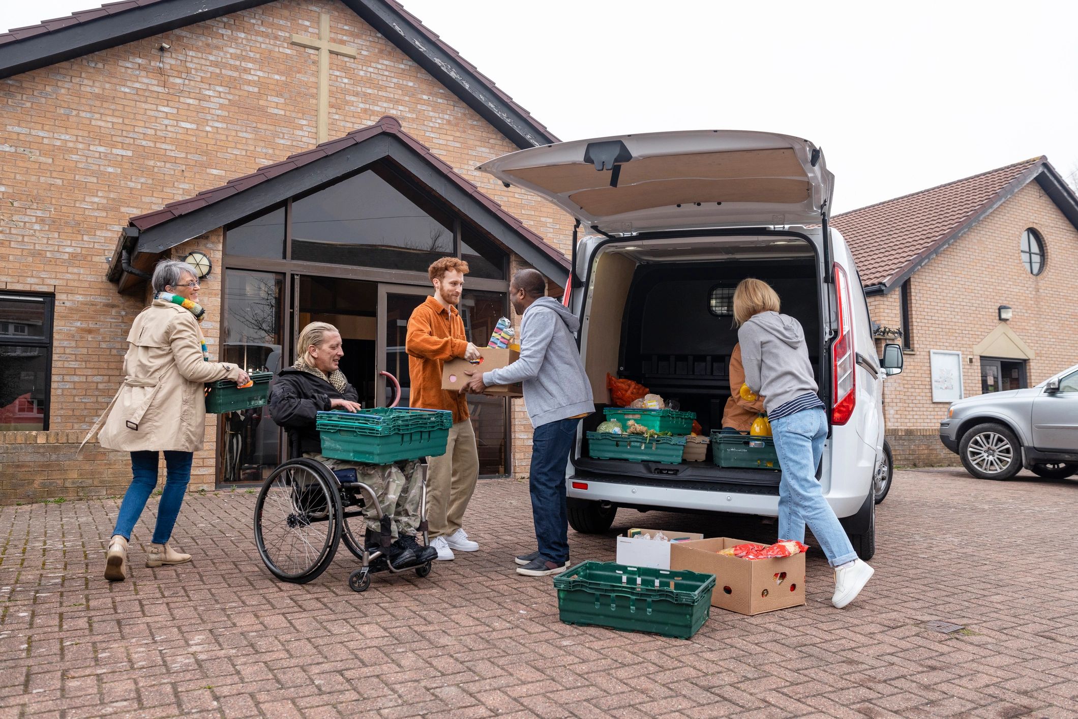 Volunteers working together in support of a community cause