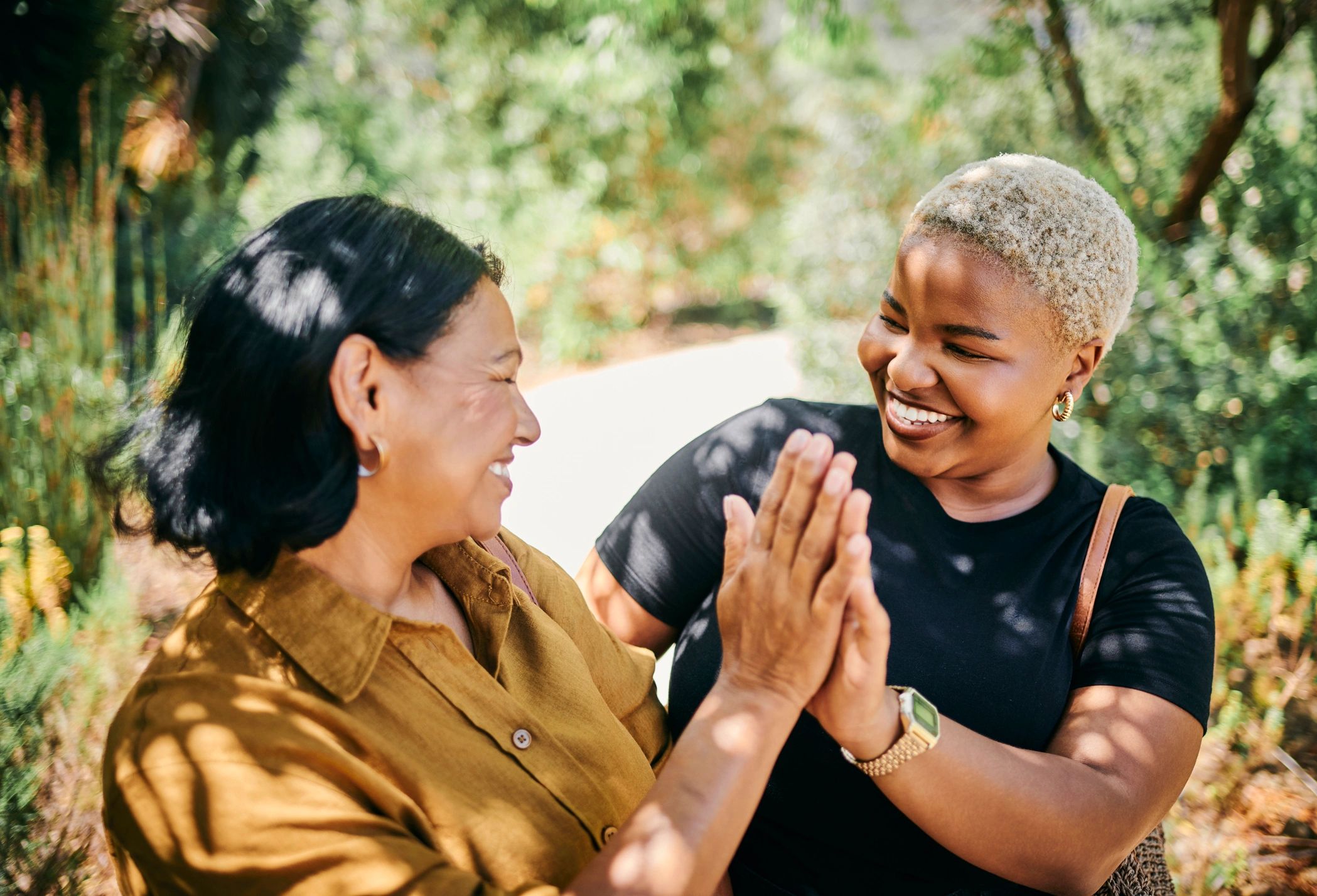 Two women sharing a hopeful walk outdoors