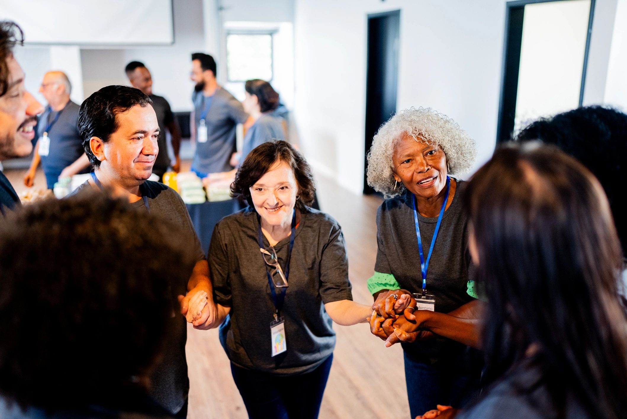 Volunteers talking and supporting one another during community outreach